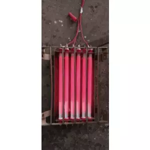 Infrared Heater Used In Industrial Setting Showing Heating Element Glowing Red