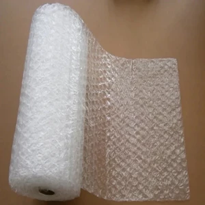 Rolls Of Air Bubble Wrap Stacked In Warehouse