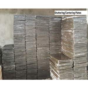 Stacked Wooden Challi Boards Ready For Rent At Construction Site
