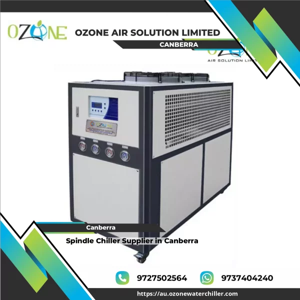 Spindle Chiller System Installed Beside CNC Machine In Industrial Setting