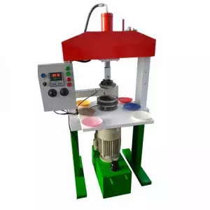 Industrial Paper Plate Making Machine Operating In Factory Setting