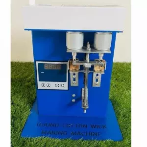 Round Cotton Wick Making Machine Operating In A Small Factory Setting
