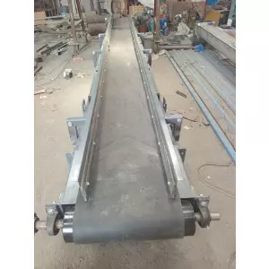 Stacker Conveyor System Installed At An Industrial Site Showing Belt Mechanism And Structure