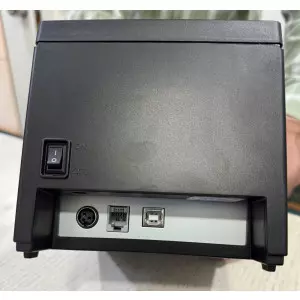 Close-up Of A Thermal Printer Showing The Thermal Head And Paper Roll Inside