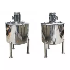 Stainless Steel Mixing Tank With Agitator Inside A Factory