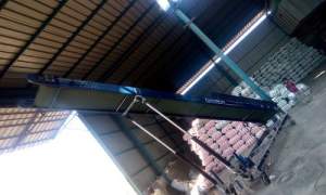 Hydraulic Bag Stacker Lifting Multiple Stacked Bags In Warehouse