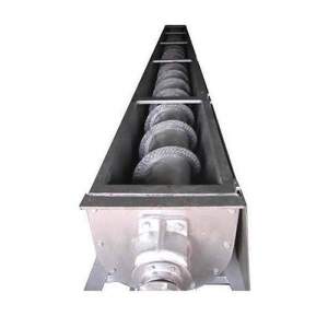 Industrial Screw Conveyor Transporting Bulk Material In Factory Setting