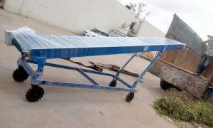 Loading Conveyor System Installed At An Industrial Site Showing Belt Movement