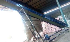 Mobile Truck Loader Moving Material Into A Large Industrial Vehicle