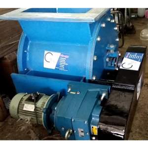 Rotary Feeder Installed In Industrial Setting Handling Bulk Materials