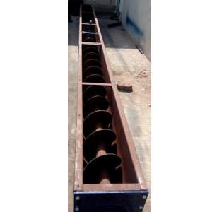 Shaftless Screw Conveyor Installed At Industrial Site Handling Bulk Material