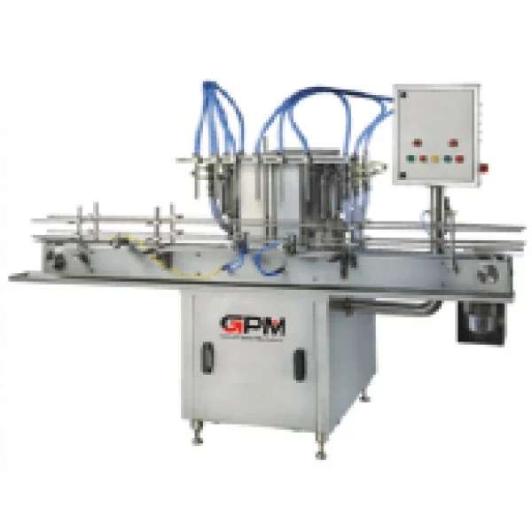 Volumetric Liquid Filling Machine Operating In Pharmaceutical Packaging Line