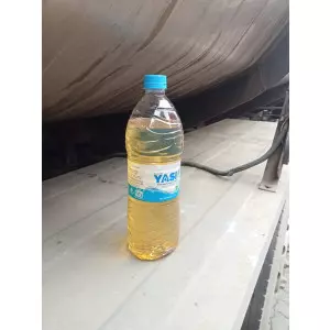 Container Of Mixed Hydrocarbon Oil With Industrial Background