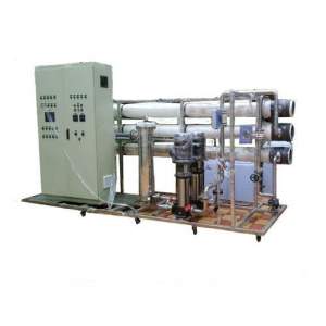 Industrial Reverse Osmosis Plant Setup Showing Filtration Modules And Control Panel
