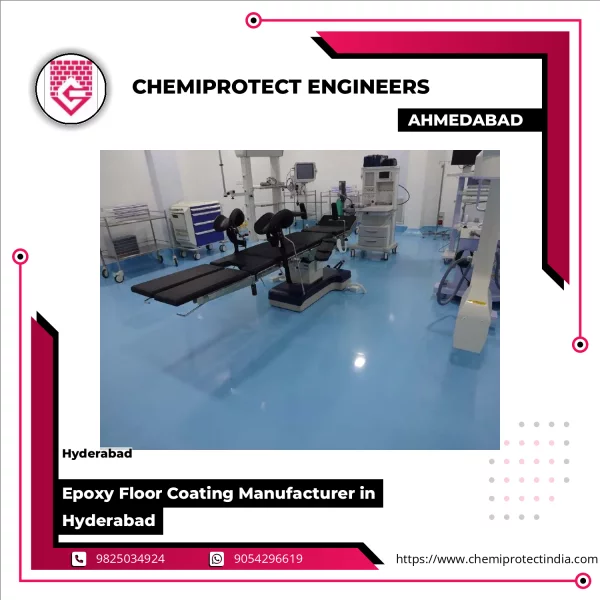 Epoxy Floor Coating Being Applied On Industrial Concrete Floor