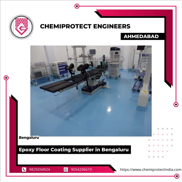 Epoxy Floor Coating Being Applied On Industrial Concrete Surface