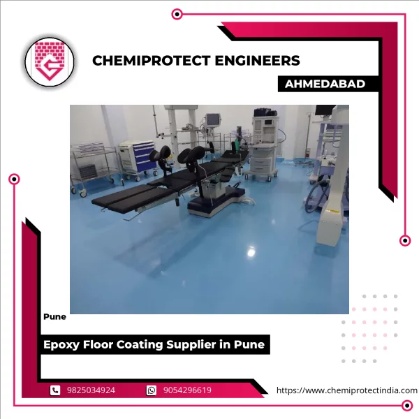 Epoxy Floor Coating Application In An Industrial Facility Showing Workers Applying Protective Resin Layer
