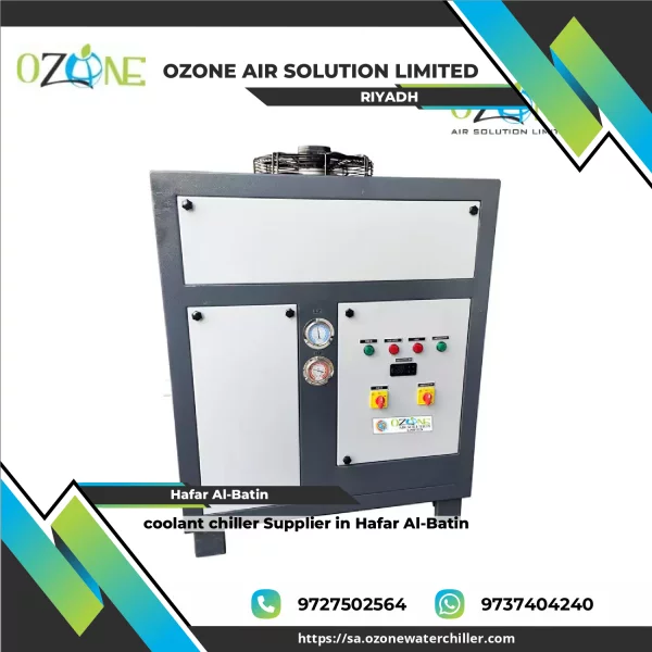 Coolant Chiller Unit Installed Outdoors Showing Pipes And Control Panel
