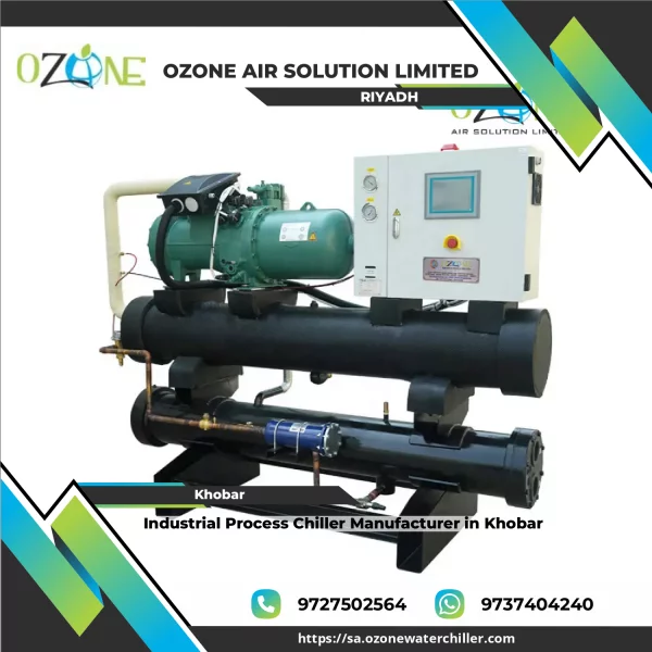 Industrial Process Chiller Unit Installed In Factory Environment Showing Cooling Pipes And Compressor