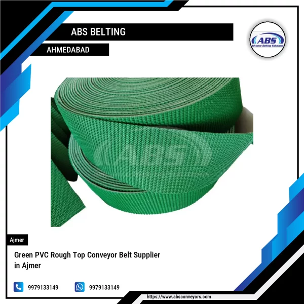Green PVC Rough Top Conveyor Belt Moving Materials On An Industrial Conveyor System