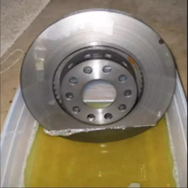 Container Filled With Industrial Degreasing Chemical Used For Cleaning Metal Surfaces