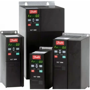 Technician Repairing Danfoss AC Drive Unit In Industrial Workshop