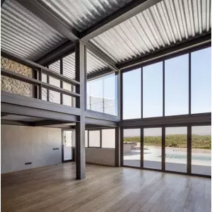 Industrial Shed Made From Fiberglass Roofing Sheets Installed In An Industrial Area