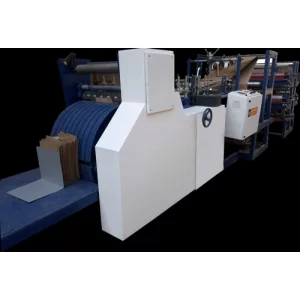 Shopping Paper Bag Making Machine Operating In An Industrial Workshop