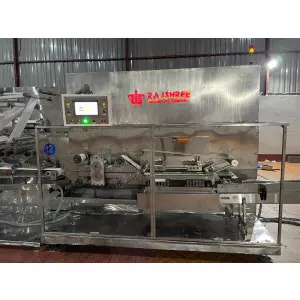Industrial Wet Wipe Making Machine In Operation At Manufacturing Plant