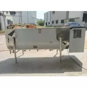 Milk Can Washer Machine In Operation Showing Stainless Steel Frame And Water Jets