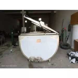 Milk Chilling Plant Setup Showing Stainless Steel Tanks With Digital Control Panels