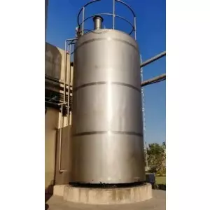 Stainless Steel Milk Silo Tank Installed At A Dairy Plant