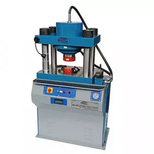 Gold Coin Press Machine Operating In Factory Setting