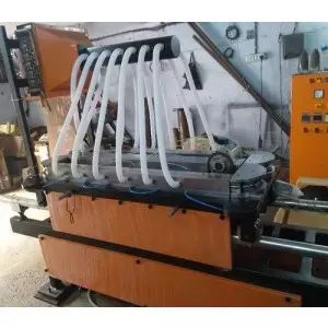 Industrial Pipe Making Machine Operating In Factory