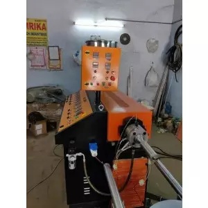 Washing Machine Drain Pipe Making Machine Operating In Industrial Setup