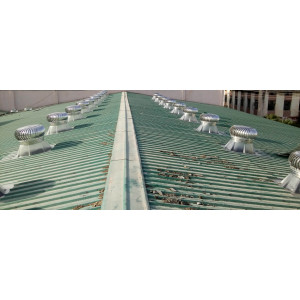 Polycarbonate Ventilator Installed On Industrial Building Roof Showing Durable Translucent Dome