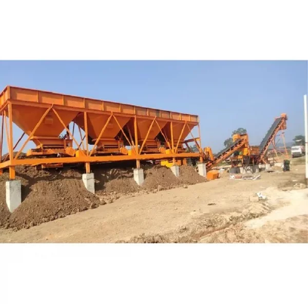 Wet Mix Plant Setup Showing Mixing Drum And Conveyor Belts At Construction Site