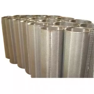 Close-up Of Strainer Perforated Sheet Showing Round Holes Pattern Used In Industrial Filtration