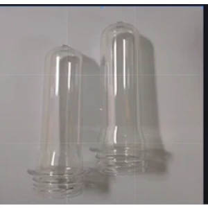 Short Neck PET Preforms Arranged In Factory Setting Showing Clarity And Uniformity