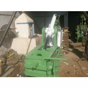 MS Baling Press Machine Operating At Industrial Site Compressing Scrap Metal