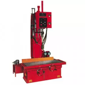 Vertical Baler Machine Compressing Scrap Material In Industrial Setting