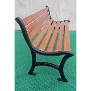 FRP Outdoor Garden Bench Placed In A Green Park Area With Trees