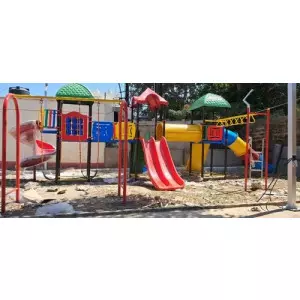 Outdoor Playground Equipment Installed In A Park Area Showing Slides And Swings