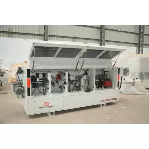 Automatic Edge Banding Machine Operating On Wooden Panels