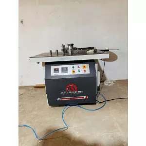 Manual Edge Banding Machine Working On A Wooden Panel In A Factory