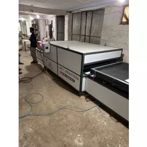 Vacuum Membrane Press Machine Operating In A Furniture Workshop