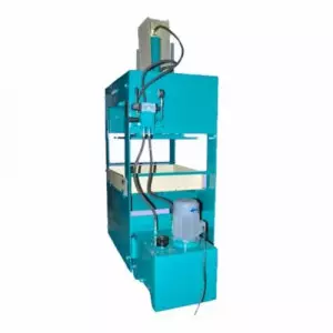 Hydraulic Press Machine In Operation Applying Pressure On Metal Sheet
