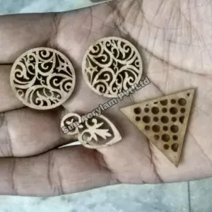 Laser Cut Wooden Gift Tags With Intricate Designs Arranged On A Table