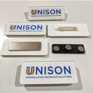 Personalized Pocket Badges Displayed With Different Logos And Designs