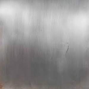 Close-up View Of Stainless Steel Plate Surface Showing Texture And Finish